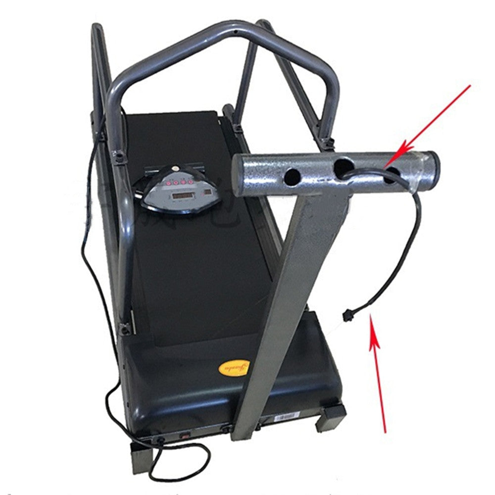 Treadmill with a metal bar attached, showing a close-up of the attachment point.