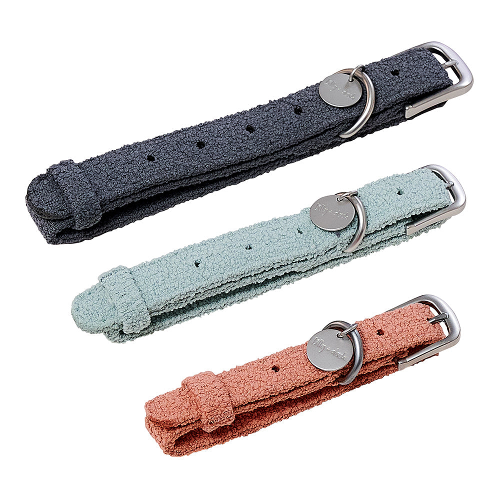 Three dog collars in gray, light blue, and pink on a white background