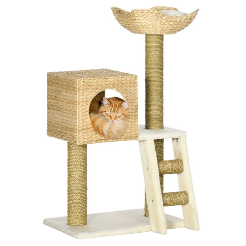 A tall cat tree with a woven beige cubby house, a ginger cat curled up inside, a top perch with a woven bed, and a small wooden ladder, shown on a plain white background.