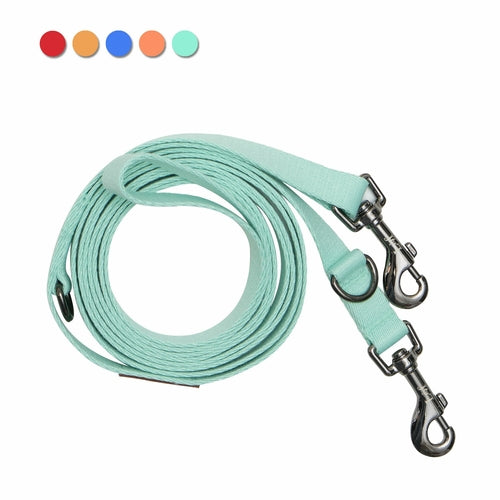Light blue dog leash with metal clasps on a white background