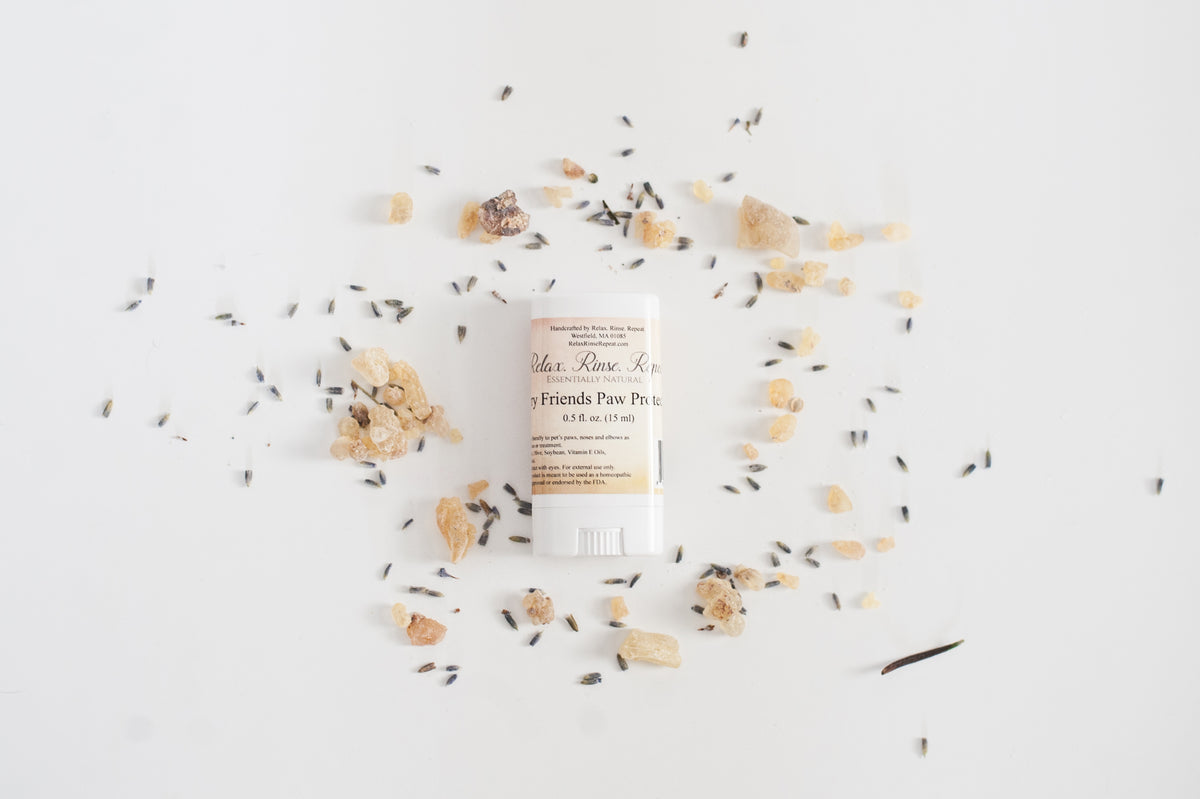 Skincare product with lavender flowers on a light background