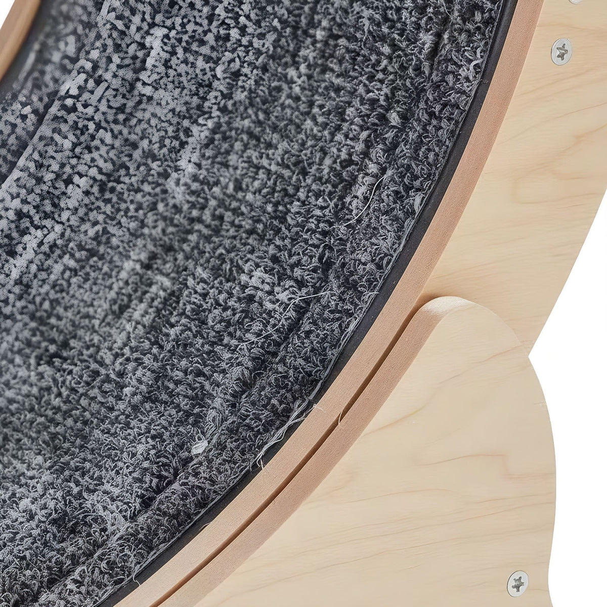 Close-up of a textured gray fabric surface with a wooden frame.