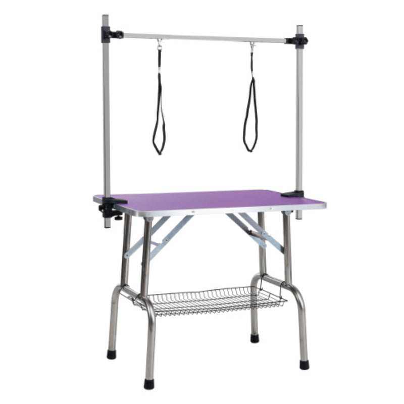 Pet grooming table with a purple surface and hanging arms on a white background