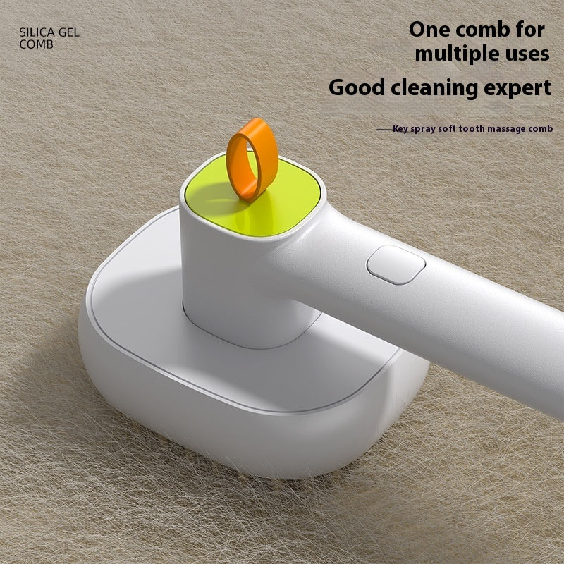 White cleaning brush with green head and orange bristle on a textured surface