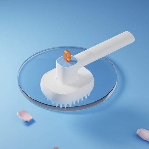 White cleaning brush with orange bristle head on a blue background