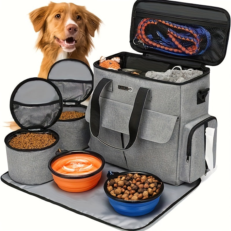 Gray pet travel bag with food bowls and a dog on a white background