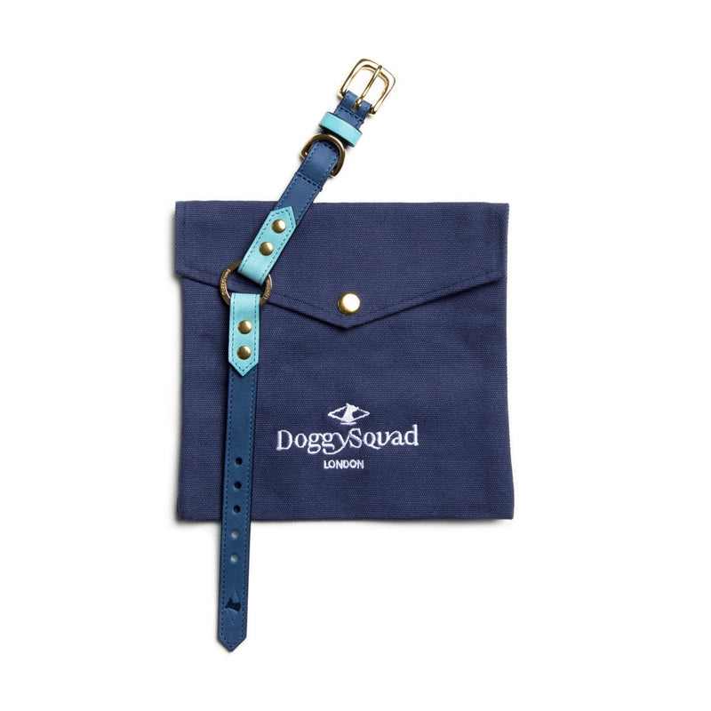 Navy blue pouch with a blue strap featuring 'DoggySquad London' branding on a white background.