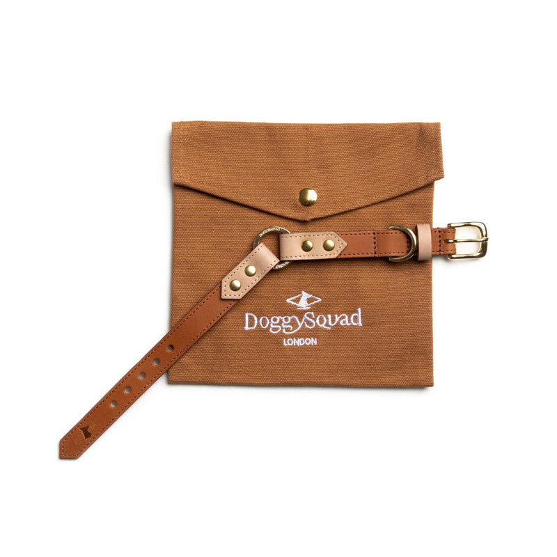 Brown pouch with strap and 'DoggySquad London' logo on a white background