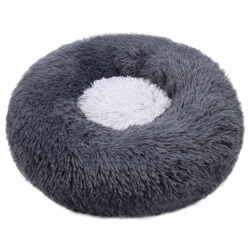 Fluffy gray pet bed on a white background