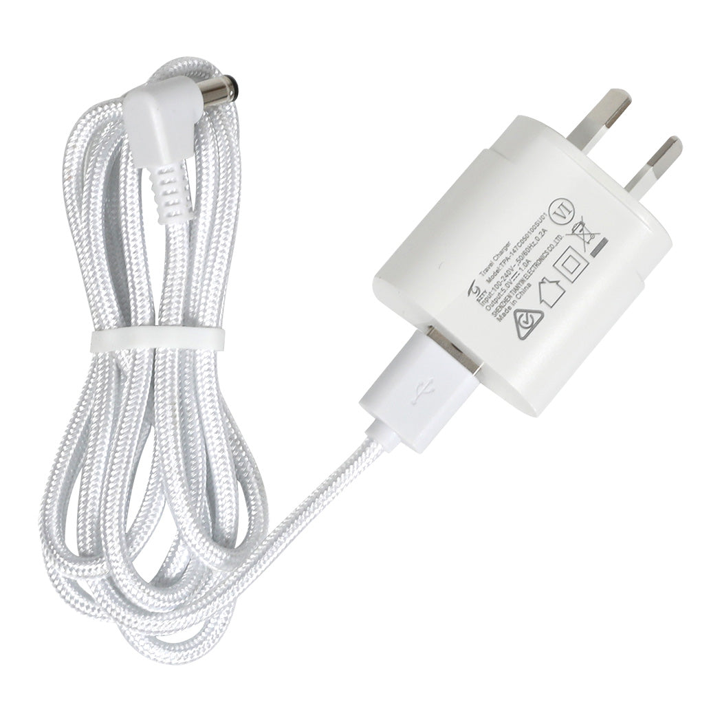 White charging cable and adapter on a white background