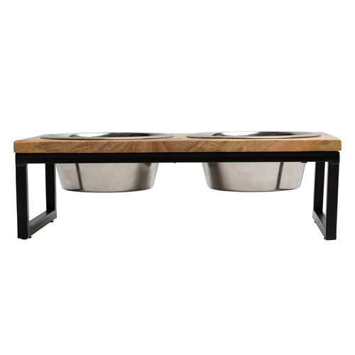 Pet feeding station with wooden top and metal bowls on a white background